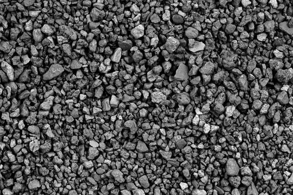 灰色の小さな岩の地面のテクスチャ 黒い小さな道路の石の背景 砂利の小石のシームレスなテクスチャ 砕いた花崗岩の砂利の暗い背景を閉じる 粘土を凝集させ — ストック写真