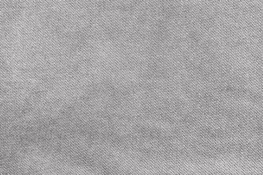 Örgü yün kumaş arka planının beyaz doğal dokusu. Beyaz pamuk kumaş, örülmüş tuval dokusu