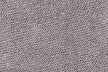 Örgü yün kumaş arka planının beyaz doğal dokusu. Beyaz pamuk kumaş, örülmüş tuval dokusu