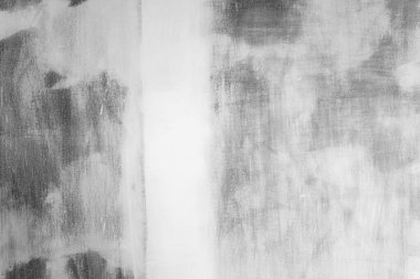 Siyah ve beyaz alçı taşı duvar boya arkaplan dokusunu kaplamıştı. Duvar bitirmeye hazır. iç inşaat işi