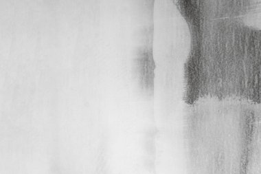 Siyah ve beyaz alçı taşı duvar boya arkaplan dokusunu kaplamıştı. Duvar bitirmeye hazır. iç inşaat işi