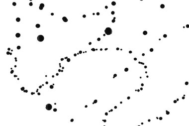 Beyaz arka planda siyah boya damlaları var.