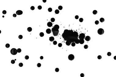 Beyaz arka planda siyah boya damlaları var.