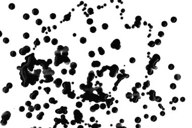 Beyaz arka planda siyah boya damlaları var.