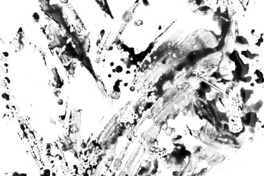 Beyaz arka planda siyah boya damlaları var.