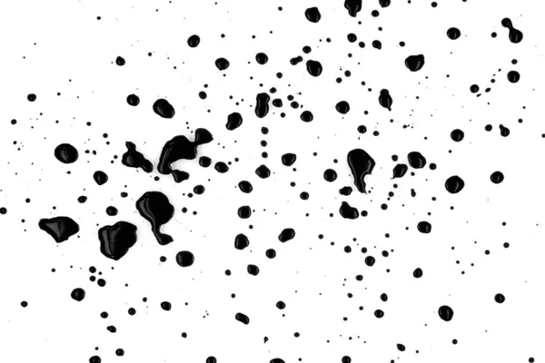 Csepp Fekete Festék Fröccsent Fehér Háttér Textúra — Stock Fotó