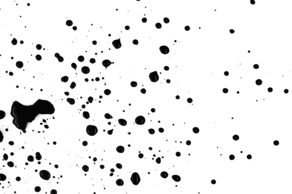 Csepp Fekete Festék Fröccsent Fehér Háttér Textúra — Stock Fotó