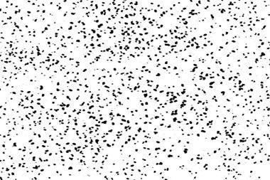 Beyaz arka planda siyah boya damlaları var.