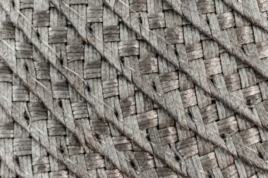 Örülmüş siyah ve gri hasır hasır arkaplan veya doku