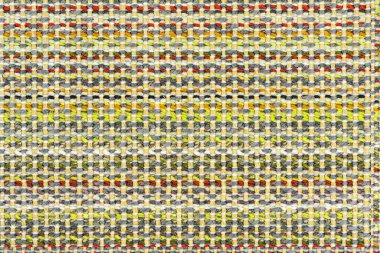 Çok renkli örgü kumaş arkaplan dokusu. Renkli kırmızı kumaş ve bir deseni var. Parça renkli yün halı, parlak hasır renkli halı.