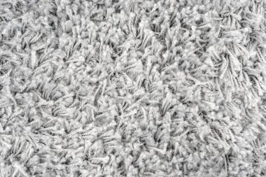Beyaz doğal yün halı dokusu. Yün kumaş dokusu parça Shaggy mat