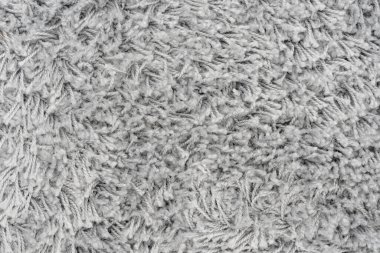Beyaz doğal yün halı dokusu. Yün kumaş dokusu parça Shaggy mat