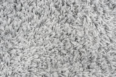 Beyaz doğal yün halı dokusu. Yün kumaş dokusu parça Shaggy mat