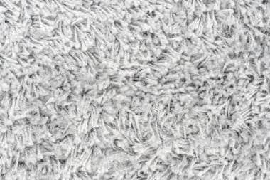 Beyaz doğal yün halı dokusu. Yün kumaş dokusu parça Shaggy mat