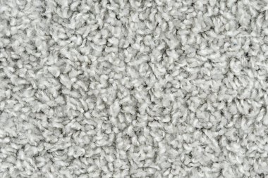 Beyaz doğal yün halı dokusu. Yün kumaş dokusu parça Shaggy mat