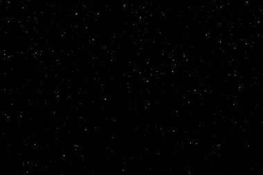 Siyah arka planda beyaz bir bokeh. Işık lekesi dokusu. Kar yağıyor. yıldız gökyüzü.