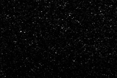 Siyah arka planda beyaz bir bokeh. Işık lekesi dokusu. Kar yağıyor. yıldız gökyüzü.