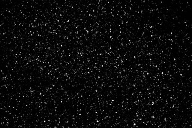 İzole edilmiş siyah arka planda kaotik beyaz yıldız bokeh. Düşen bulanık kar örtüsü, yıldızlı gökyüzü. Siyah arka planda beyaz lekeler, beyaz damlalar ve lekeler. soyutlama.