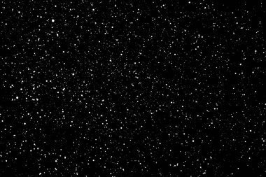 İzole edilmiş siyah arka planda kaotik beyaz yıldız bokeh. Düşen bulanık kar örtüsü, yıldızlı gökyüzü. Siyah arka planda beyaz lekeler, beyaz damlalar ve lekeler. soyutlama.