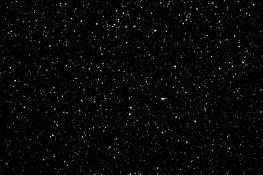 İzole edilmiş siyah arka planda kaotik beyaz yıldız bokeh. Düşen bulanık kar örtüsü, yıldızlı gökyüzü. Siyah arka planda beyaz lekeler, beyaz damlalar ve lekeler. soyutlama.