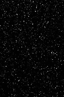 İzole edilmiş siyah arka planda kaotik beyaz yıldız bokeh. Düşen bulanık kar örtüsü, yıldızlı gökyüzü. Siyah arka planda beyaz lekeler, beyaz damlalar ve lekeler. soyutlama.