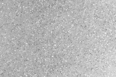 Siyah lekeli gri duvar ve arka planda çizikler var. soyut yüzey