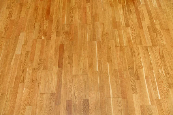 Brown laminate floor texture background. natural wooden polished surface parquet