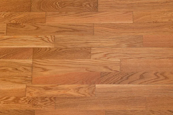 Brown laminate floor texture background. natural wooden polished surface parquet