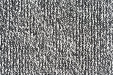 Örgü yün kumaş arka planının beyaz doğal dokusu. Beyaz pamuk kumaş, örülmüş tuval dokusu