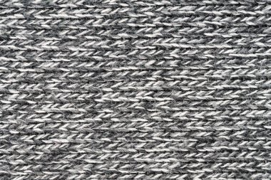 Örgü yün kumaş arka planının beyaz doğal dokusu. Beyaz pamuk kumaş, örülmüş tuval dokusu