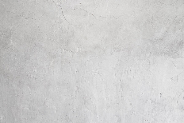 Грубый белый рельеф лепнины с трещинами стены текстуры фона. пробелы для дизайнеров