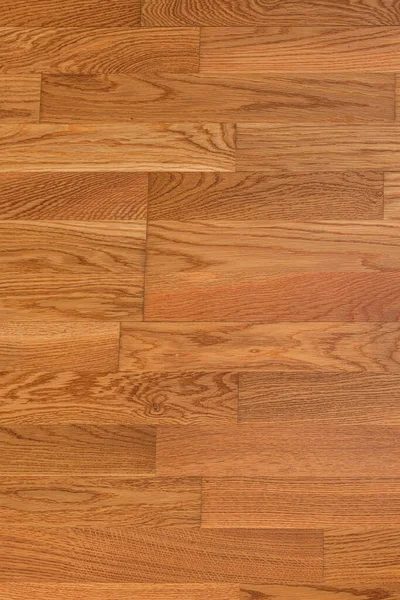 ブラウンラミネートの床の質感の背景 天然木の研磨面の寄木細工 — ストック写真