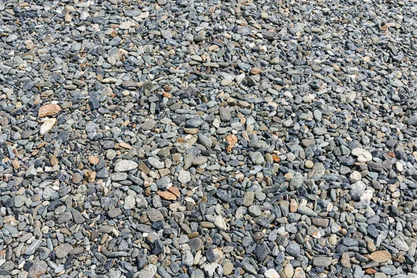 黒の小さな道路石の背景 暗い砂利小石の石のテクスチャ 花崗岩 大理石 — ストック写真