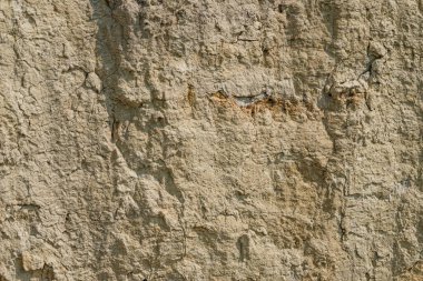 Kilden bir taş ocağında yer altındaki farklı katmanların dokusu. kil duvar arkaplanı kapat