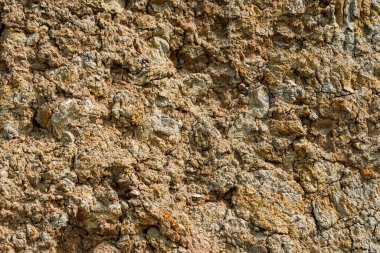 Kilden bir taş ocağında yer altındaki farklı katmanların dokusu. kil duvar arkaplanı kapat