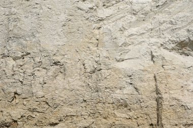 Kilden bir taş ocağında yer altındaki farklı katmanların dokusu. kil duvar arkaplanı kapat