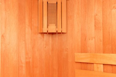 Arkaplan olarak içi boş sauna odası.