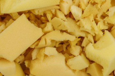 Sarı poliüretan köpük plastik arka plan dokusu. Yastık ve mobilya doldurma