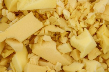 Sarı poliüretan köpük plastik arka plan dokusu. Yastık ve mobilya doldurma