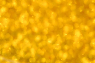 Hassas altın desenli bokeh arka plan. Bulanık sarı sonbahar arkaplanı