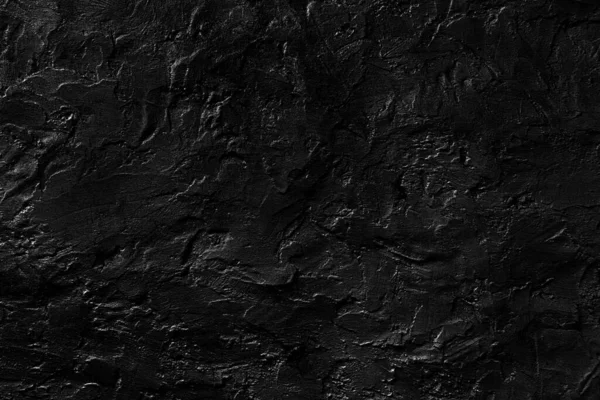 Seamless black rough concrete wall texture background.  dark cement wall.  grey plaster texture. blank for the designer