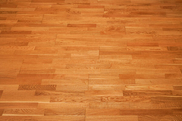 Seamless brown laminate floor texture background. natural wooden polished surface parquet