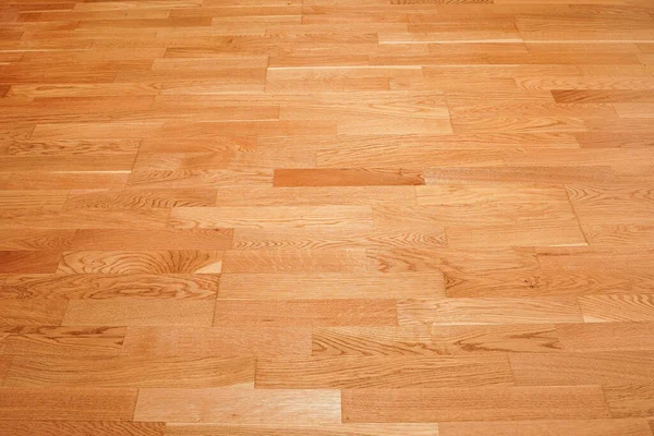 Seamless brown laminate floor texture background. natural wooden polished surface parquet