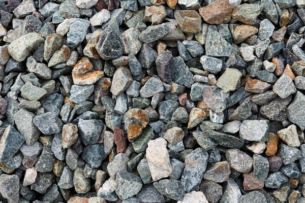 Small road stone background, gravel pebbles stone texture, granite,marble