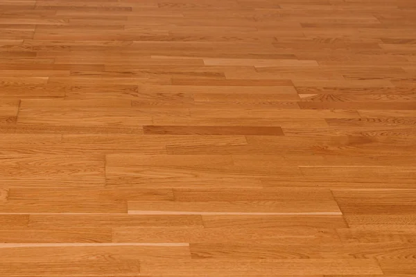 Seamless brown laminate floor texture background. natural wooden floor lacquered parquet