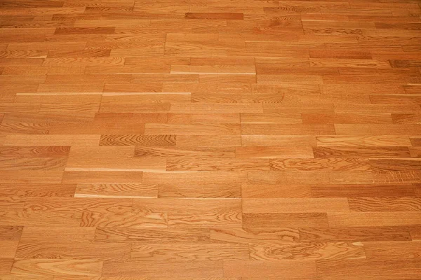 Seamless brown laminate floor texture background. natural wooden polished surface parquet