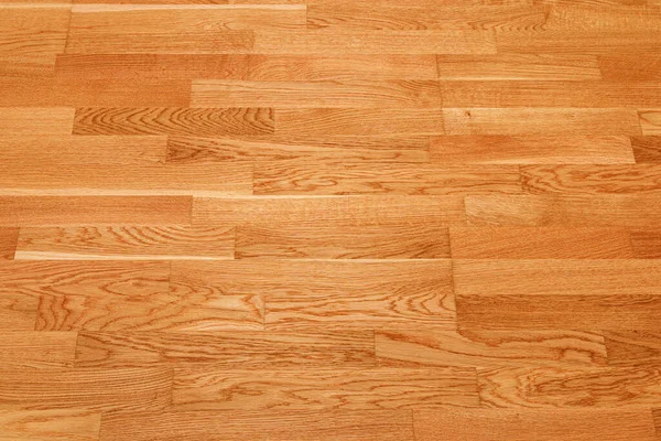 Seamless brown laminate floor texture background. natural wooden polished surface parquet