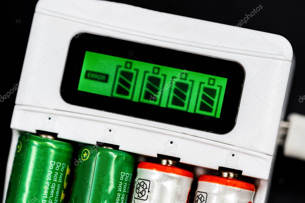 Battery Charging Process. Green Screen With Battery Indicator. battery charger Close Up