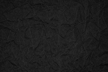 Siyah buruşmuş ambalaj kağıdı arka plan dokusu. Koyu Kraft Kağıt Kaba. Kırışık kese kağıdı.
