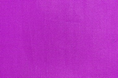 Mor tekstil kumaşının desen arkaplanlı dokusu